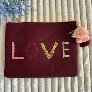 Stella & Dot | L.O.V.E tassel clutch